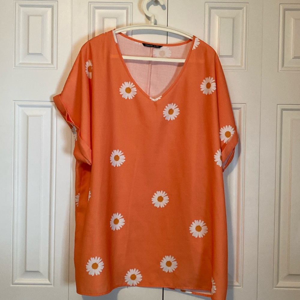 Never been worn but washed XXL v neck short sleeve shirt from Noracora